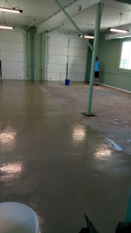 Applying industrial commercial paint and epoxy