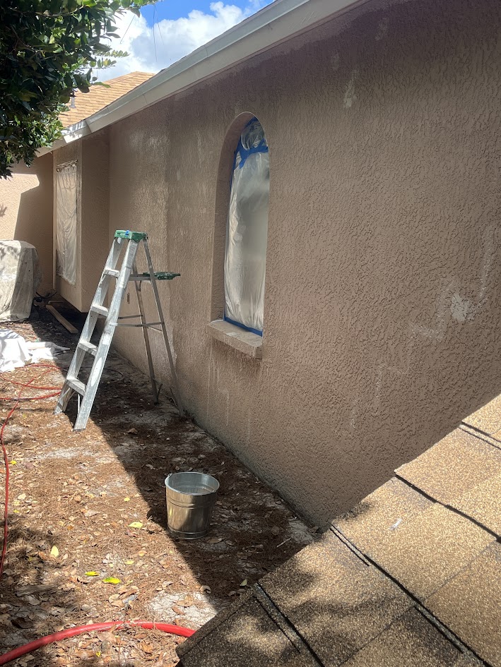 Stucco with repaired cracks.