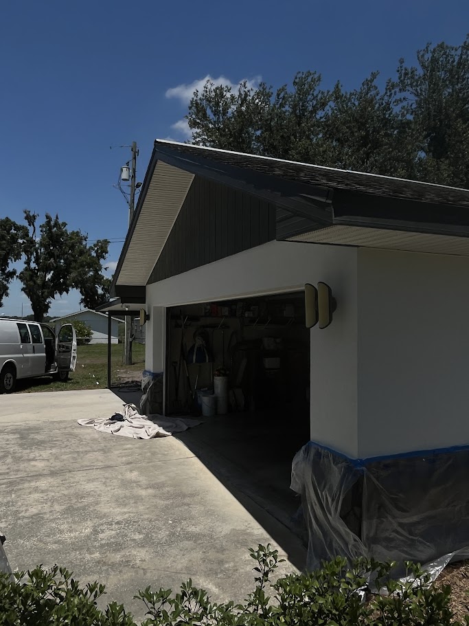 Finished bright white exterior garage wall.